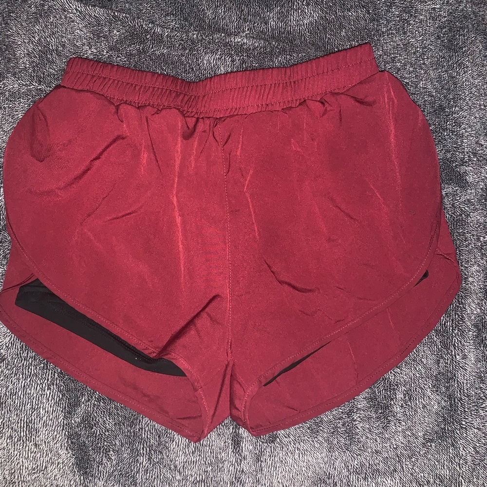 Burgundy. Athletic shorts with pockets on the inside